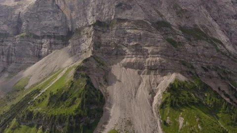 Towering Limestone Wall Above Alpine Scree Slopes in Eng Alm Austria Stock Footage 340485488