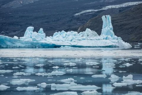 Towering pinnacle on a broken iceberg below the Columbia Glacier in Alaska. Stock Photos