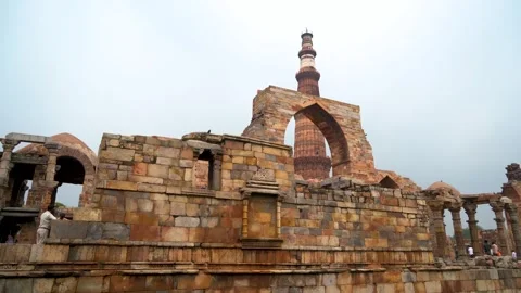 Towering Qutub Minar Against Dramatic Sky Stock Footage 317095363