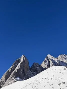 Towering Ridges Beneath Endless Blue. Stock Photos