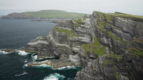 Towering Rock Cliffs Above Atlantic Waves in Kerry Video stock 347687809