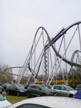 Towering Roller Coaster with Loops and Cars Stock Photos