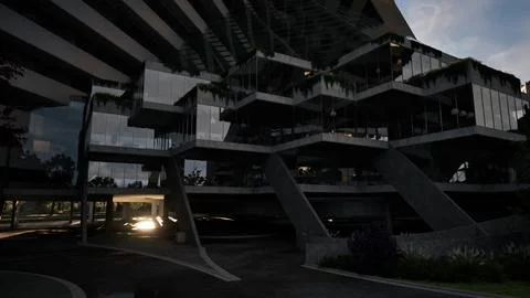 A towering skyscraper with a multitude of windows Ilustración de archivo