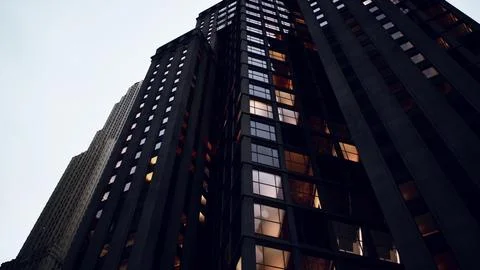 A towering skyscraper with a multitude of windows Stock Illustration