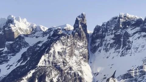 Towering snow-covered peaks in Chile's fjords pass slowly Stock Footage 321158549