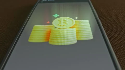 Towering Stack of Bitcoin, graphic presentation on smartphone Stock Footage 303426619