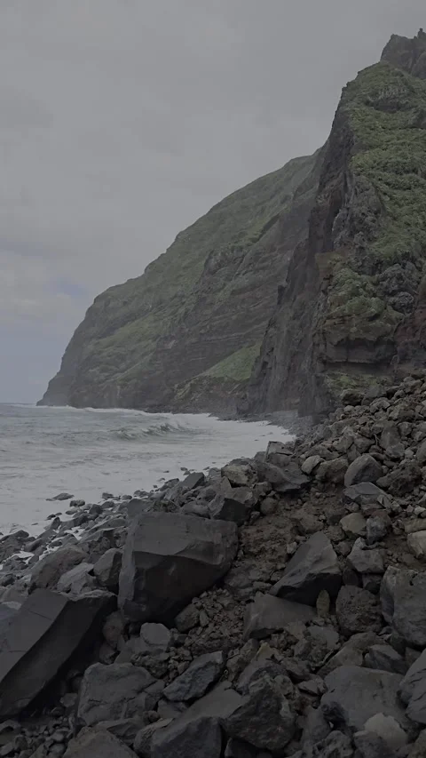 Towering volcanic cliffs and crashing Atlantic waves define Madeira’s raw north  Video stock 310024414