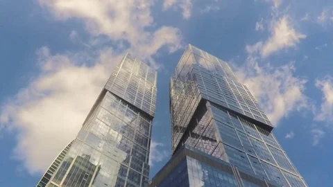 Towers and clouds on blue sky timelapse Stock Footage 79809968