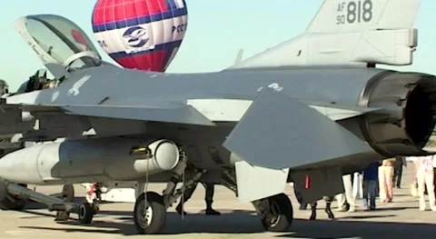 Towing of American multifunctional fighter F-16 Fighting Falcon at parking lot. Stock Footage 182906825
