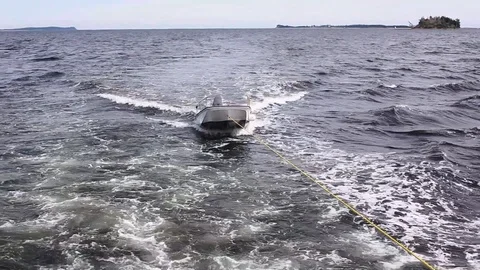 Towing Dingy with rope Stock Footage 94070146