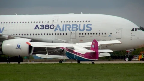 Towing four-engine wide-body two-story passenger passenger Airbus A-380. Stock Footage 118647614