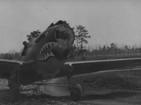 Towing a propellerless P-40 Warhawk Stock Footage 158183308