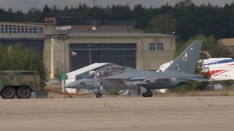 Towing Russian double-seat combat training aircraft Yak-130 NATO: Mitten. Stock Footage 117541579