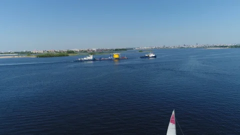 Towing Ship Pulls The Barge. Volga River. Sailing Yacht. Aerial View. Tatarstan. Video stock 127789780