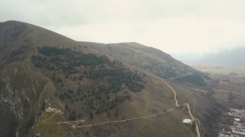 A town among the mountains Stock Footage 114803506