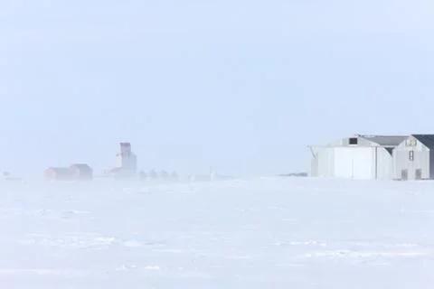 Town and Grain Elevator in Blizzard Saskatchewan Stock Photos