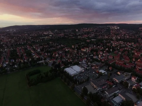 Town and Patchwork Fields Aerial During Sundown 스톡 동영상 84343718