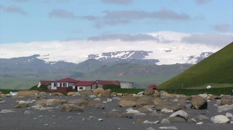 Town from the beach with 2 glaciers in the background Stock Footage 37585462