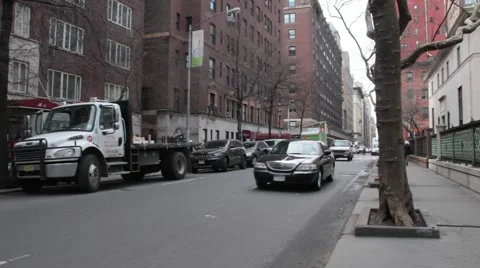Town Car Right to Left in Murray Hill NYC Stock Footage 53892111