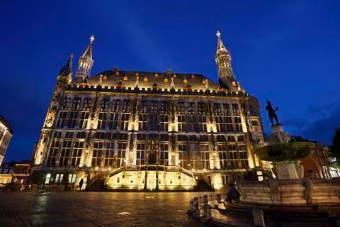 The town hall of Aachen, Germany with night blue sky and illumination. The fo Stock Photos