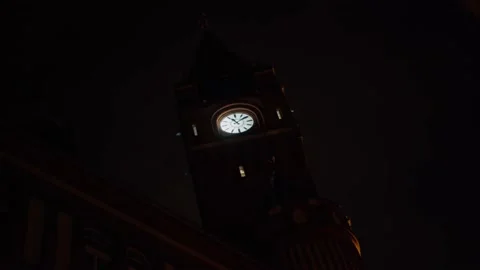 Town Hall Clock at Night with Clouds moving in the Background Stock Footage 169489237