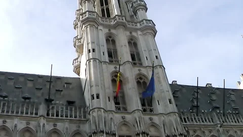 The Town Hall tower with flags of Belgium and European Union. Stock Footage 152686243