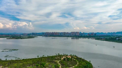 Town Lake with Cloud Movement Time Lapse Aerial 4K Stock Footage 320043077