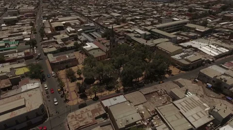 Town in the middle of the bone-dry desert in a sunny day Stock Footage 63298925
