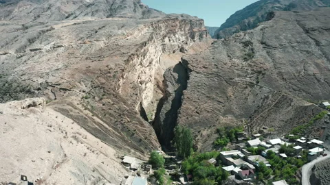 Town in mountain valley, river and hydroelectric power station Stock Footage 165565613