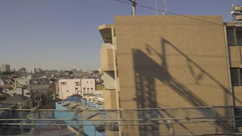 Town passing by from bullet train Stock Footage 230538441