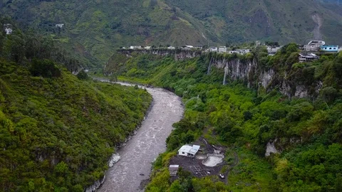 Town On Plateau Next To River [Drone Footage] Stock Footage 88346347