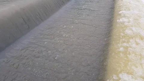 Town river after a havy rainfall Stock Footage 83080265