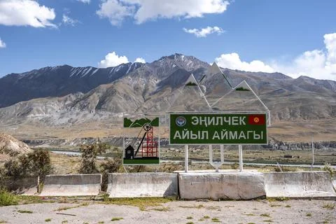 Town sign in Cyrillic script, Engilchek, Tian Shan, Kyrgyzstan, Asia Stock Photos