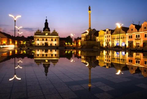 Town square at night and reflection in the water. Stock Photos