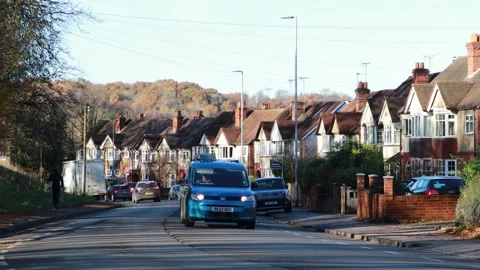 Town traffic in England Stock Footage 256469437