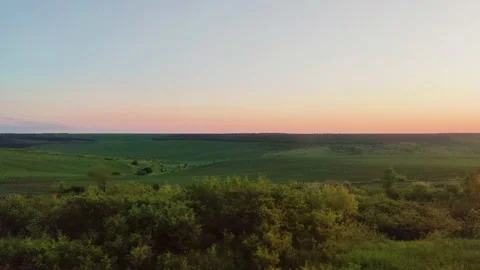 Town train road trip side window with a beautiful landscape. Nature green hills Stock Footage 154507298