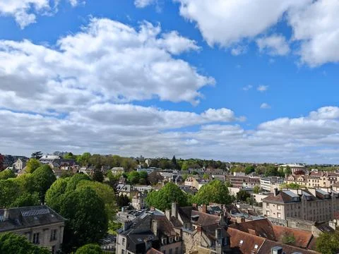 Town view with rooftops and trees under blue sky Fotos Stock