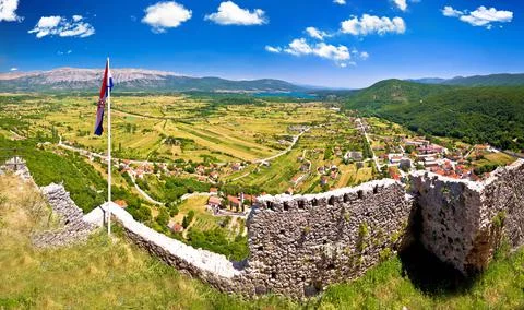 Town of Vrlika and Peruca lake aerial panoramic view from Prozor fortress Stock Photos