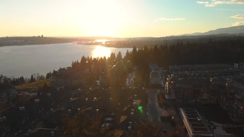 A townhouse complex at the edge of an evergreen forest in North Vancouver, BC Stock Footage 104458660