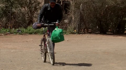Township man on bicycle Stock Footage 59918667