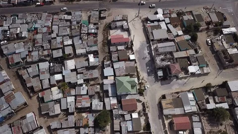 Township slum in Cape Town seen from drone flying above Stock Footage