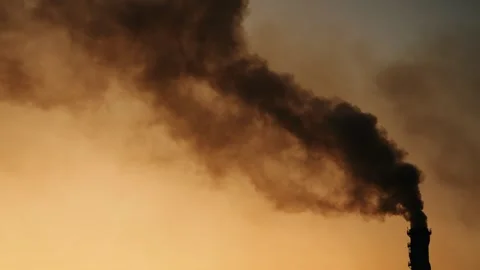 Toxic clouds of black smoke emitted by an industrial plant. Stock Footage 314253003