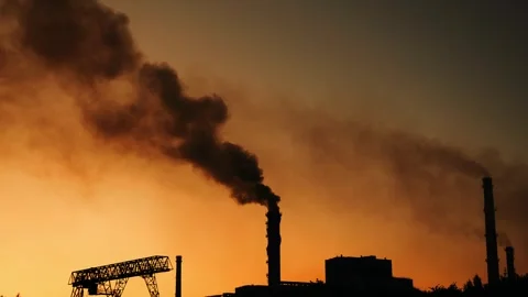 Toxic clouds of black smoke emitted by an industrial plant. Stock Footage 314253029
