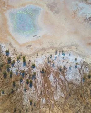 Toxic copper mine dumps surface, aerial view directly above Stock Photos