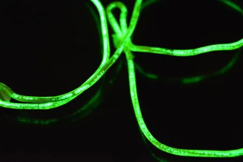 Toxic green lime lighting with specific pattern neon electroluminescent wire. Stock Photos