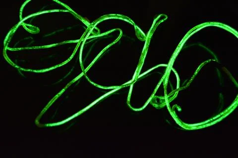 Toxic green lime lighting with specific pattern neon electroluminescent wire. Stock Photos