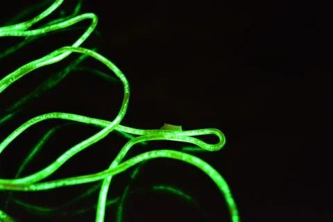 Toxic green lime lighting with specific pattern neon electroluminescent wire. Stock Photos