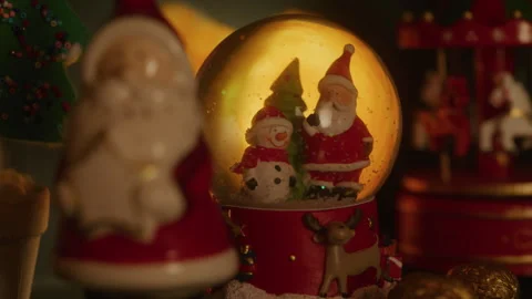 Toy ball with a horse inside and golden snow Stock Footage 265437679