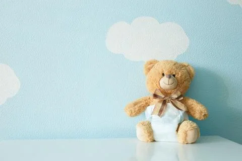 Toy bear dressed in diaper Stock Photos