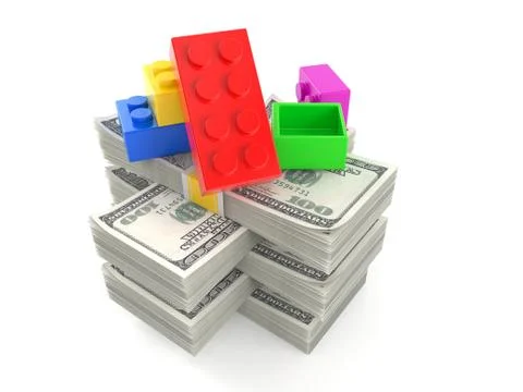 Toy block on stack of money Stockillustratie